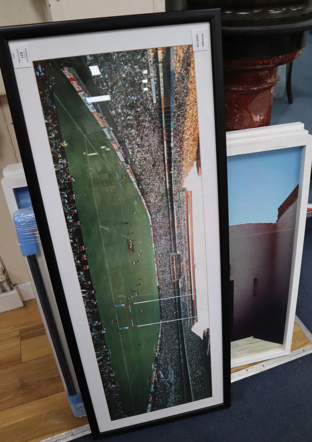 A set of three modern photographic prints, Beach Bar, Diver and Buoys, 72.5 x 72.5cm and two Rugby related photographs